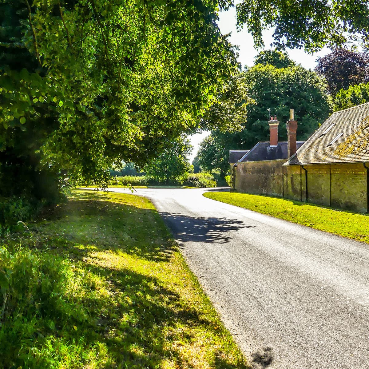 country road with house to the right hand side