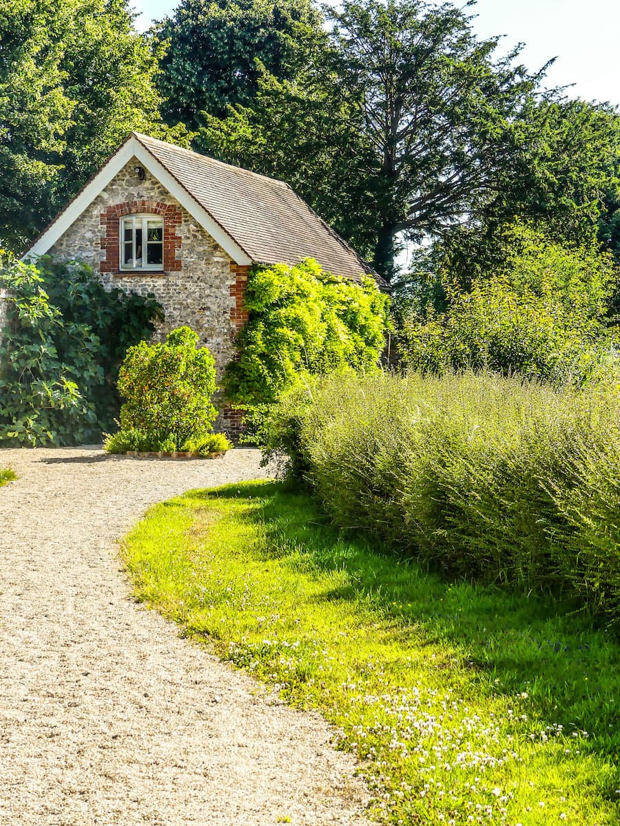 country lane leading to detached house